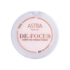 De-focus correcting pressed powder