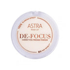 De-focus correcting pressed powder